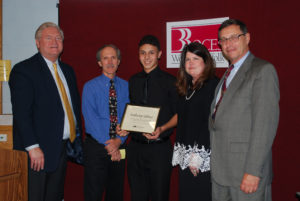 Anthony Sabino (center) is congratulated by (from left) COO Michael Flynn, Digital Film and Video Production teacher Steve Stankowski, Executive Director Nancy Kelsey and Board President Peter Wunsch.
