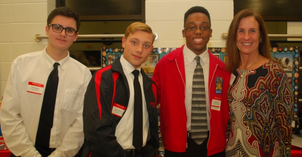 Wilson Tech students in Aviation Flight/Science (l. to r.) Quinn Hughes of Huntington, Kyle Trenholm of Lindenhurst and Jahad Hoyte of Half Hollow Hills West welcome Kelly Fallon, Superintendent of Half Hollow Hills School District to the annual Board Dinner at Western Suffolk BOCES,