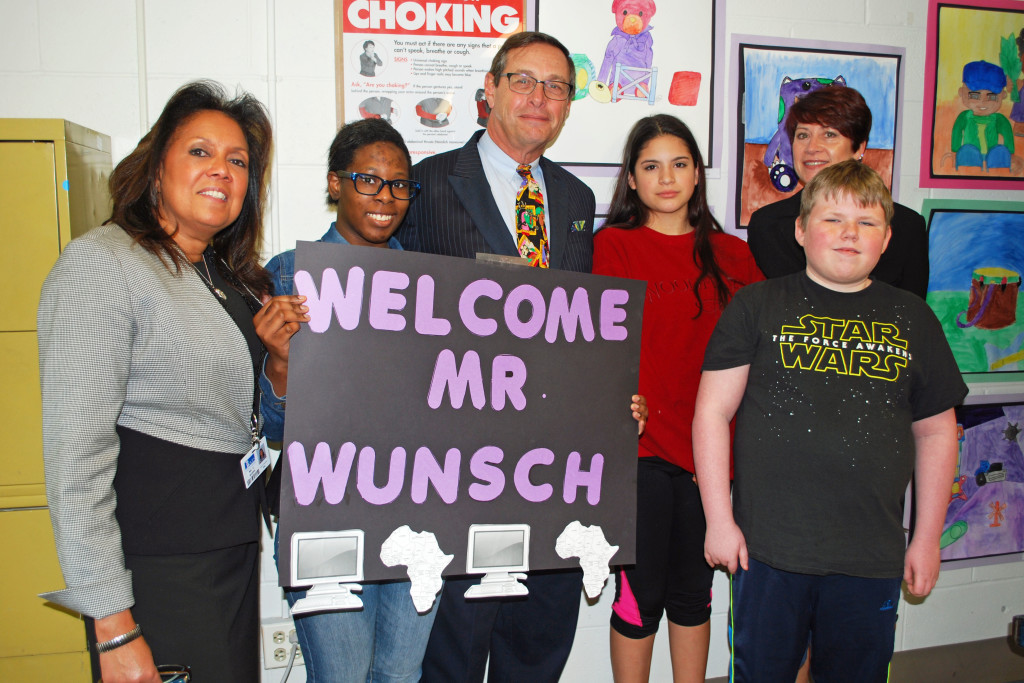 Welcoming Peter Wunsch (third from left), president of the Western Suffolk BOCES Board of Education are (from left) Chandra Rivera, principal, Brennan Middle/Senior High School; Deja Flemmings, senior, Wyandanch School District; Dianne Ramos, eighth grade, South Huntington School District; Teresa Strum, Executive Director, Special Education Division, WS BOCES; and Joseph Polk, eighth grade, Commack School District.